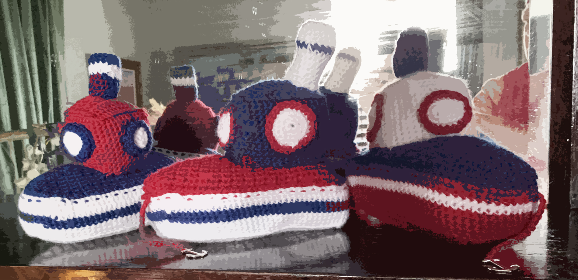 Crocheted tugboats by Jen