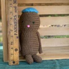 crocheted peanut doll