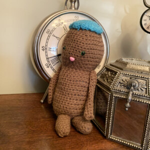 crocheted peanut doll